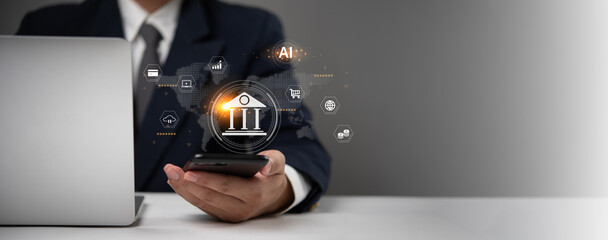 Businessman holding smartphone with digital banking and AI icons. Modern technology, fintech, and...