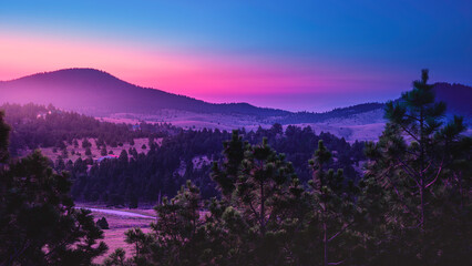 Helena Suburb Sunrise Skyline over the Helena National Forest and Avalanche Butte in Montana, USA:...