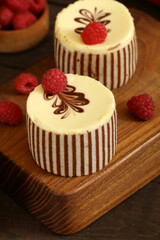 mini cake with berries and whipped cream