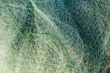 Fishermen's fishing nets are piled up.