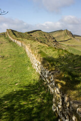 The Impressive Roman Ruins of Hadrian’s Wall, snaking through the English countryside along the Winshields cliffs.