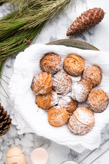 Christmas shortbread cookies.  Christmas cookies with  on a snowy surface with pine cones