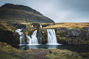 Fototapeta premium Waterfalls at Kirkjufell Mountain in Iceland.