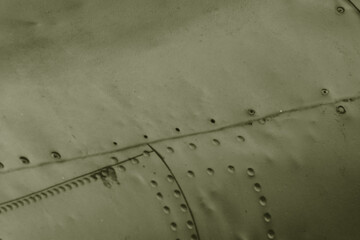 Fragment of the fuselage skin of an old aircraft.