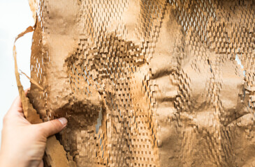 Brown eco friendly packing paper for glassware and dishes.