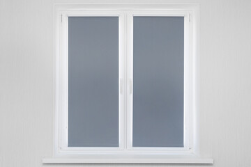 Obraz premium Roller blinds cover the windows in the interior. Blackout roller blinds.