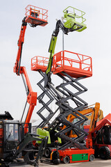 Several different wheeled scissor lifts and wheeled articulated lists with telescopic boom. © Studio Peace