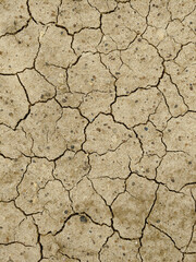 Dry cracked soil on summer in india stock photo