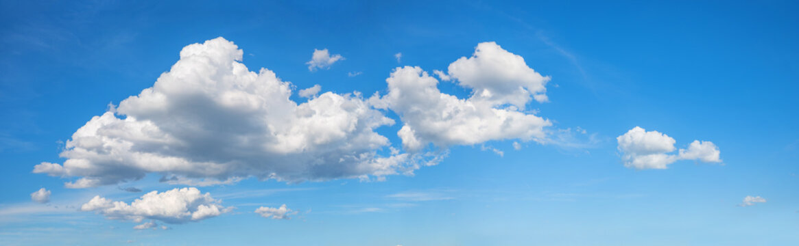 beautiful blue sky panorama background with white and grey clouds
