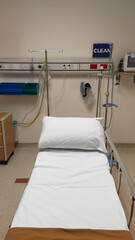 Clean and Organized Emergency Room with Medical Equipment and Bed in a Hospital