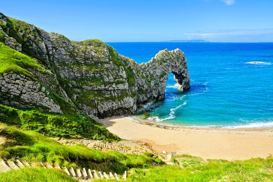 Scenic Durdle Door under blue skies, Dorset coast, England, UK