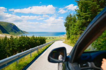 View of the road from inside the car. Traveling by car. View of the road and the panel of the car....