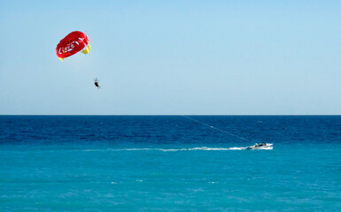 Para sailing on the turquoise water in Nice, France