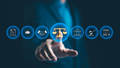 Legal Professional with Justice Icons. A suited legal professional touches virtual icons...