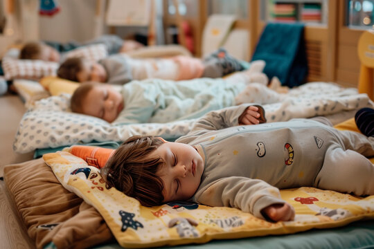 Toddlers taking a nap in a daycare center