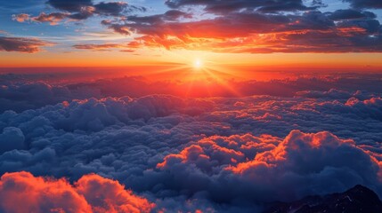 Fototapeta premium Sunrise Above the Clouds