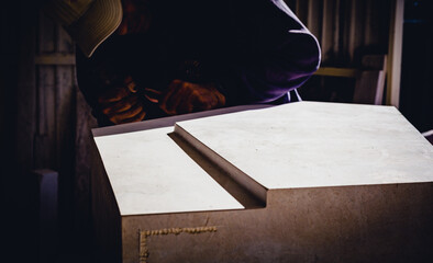 artisan working in a block of marble