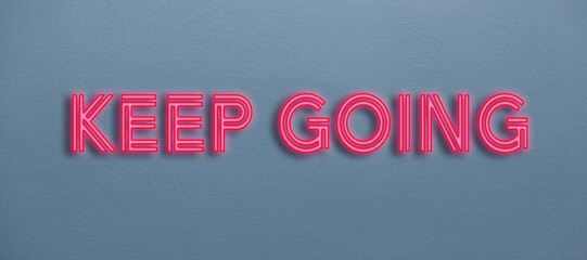 Keep going neon sign on a wall
