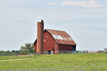 Red Barn in a Farm Field