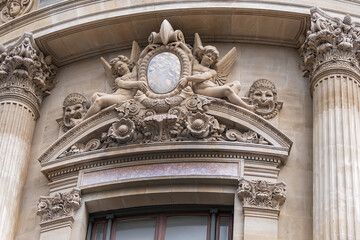 Architectural details of famous neo-baroque building Opera National de Paris. Grand Opera (Garnier...