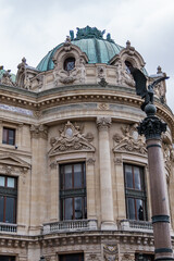 Architectural details of famous neo-baroque building Opera National de Paris. Grand Opera (Garnier...
