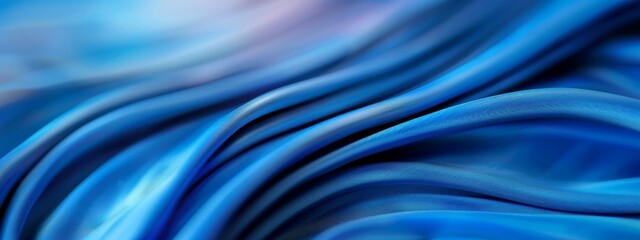 Fototapeta premium A tight shot of a blue fabric, its texture slightly blurred in the frame's center