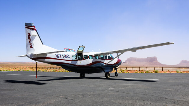 Monument Valley, UT, USA - June 17, 2024; Westwind Cessna Caravan C208 N71SC on ground in Monument Valley during dust storm
