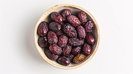 Bowl of pitted dates isolated on white background, top view
