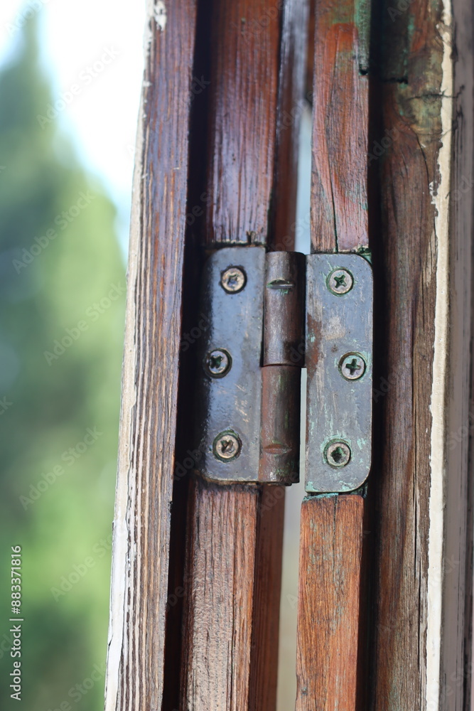 Poster a detailed shot of a wooden bench with a hinge, suitable for use in furniture or diy projects.
