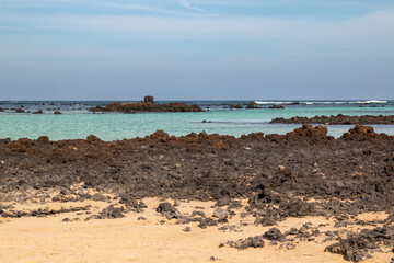 Shallow Atlantic ocean water in Caleton Blanco, Lanzarote