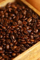 coffee beans in a wooden box