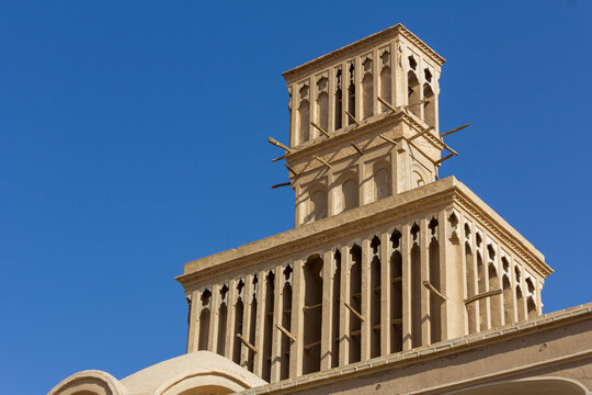  The wind catcher or ventilation tower made with adobes, a genius way to cool down the heat of hot summers with power of nature in the historical mansion of Aghazadeh in Abarkuh, Yazd, Iran.