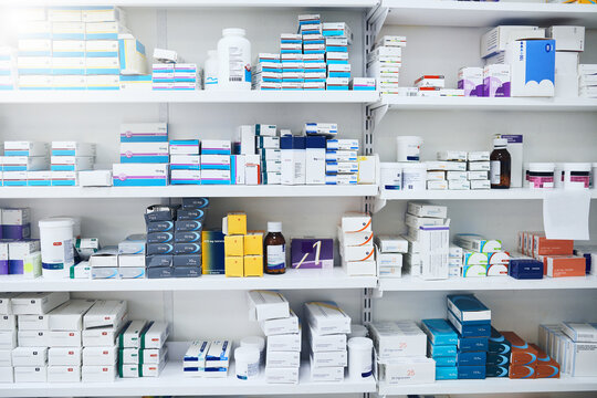 Pharmacy, medicine and box with vitamins shop, shelf and prescription care pills. Medical, retail store and supply of health supplements, healthcare and minerals for vitality and wellness dispensary