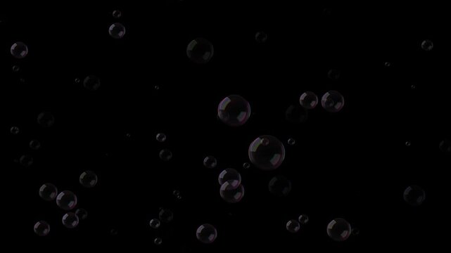 soap bubbles of medium size randomly rushing upwards