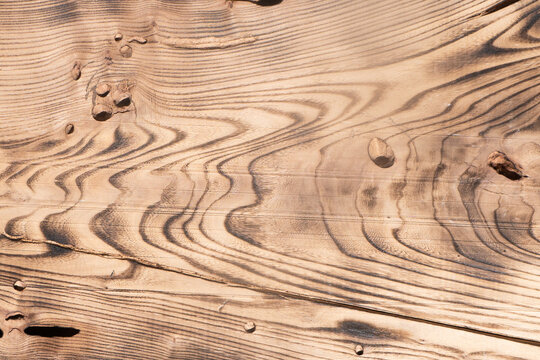 Production of a wooden table from an array of Karagach. Wood Slabs. Exclusive home table, solid wood slab, wood texture background.