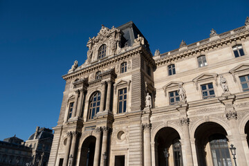 view of the city of light during the day on a blue sky day with its typical architecture
