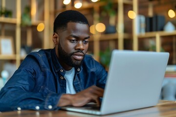 Fototapeta premium African American Participant Engaged in Online Business Webinar