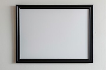a photo frame mockup, landscape orientationa sincle black picture frame, 10x20 inches, blank, hanging in landscape format, on a white wall