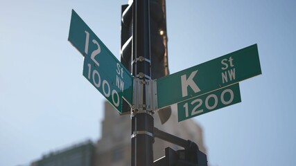 Fototapeta premium K street nw and 12th street nw street signs in downtown Washington DC symbolizing lobbying and corruption in nations capital