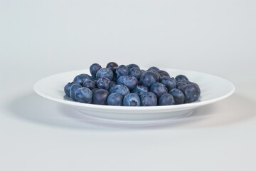 Food photography - Summer fruits blueberry background - Closeup of ripe blueberries and leaves in a bowl on dark table (Generative Ai). Beautiful simple AI generated image in 4K, unique.