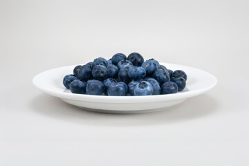 Yogurt with blueberries and mint in a bowl. Close-up view. Healthy eating, healthy snacks, diet, fitness, sports food. Beautiful simple AI generated image in 4K, unique.