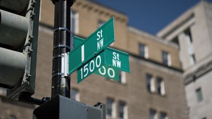 I street NW and 15th street NW street signs in downtown Washington DC symbolizing lobbying and corruption in nations capital