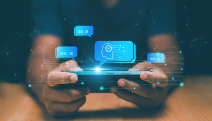 Chat with AI or Artificial Intelligence technology, Businessman using smartphone for chatting online with AI or chatbot. Futuristic technology transformation, Online automation chatbot.