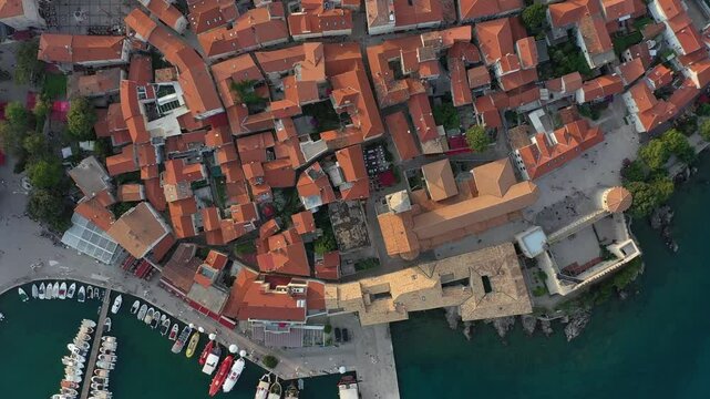 Panoramic view of the old town of Krk in Croatia, cathedral tower and seascape in background