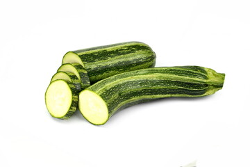 green zucchini or courgette vegetables isolated on white back ground