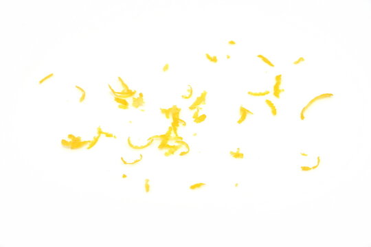 Grated lemon Rinds Isolated. Raw Citrus Peel, Grated lemon Skin, Fresh Zest on White Background 