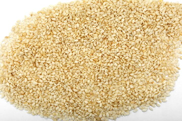 Organic integral sesame seeds isolated on white background