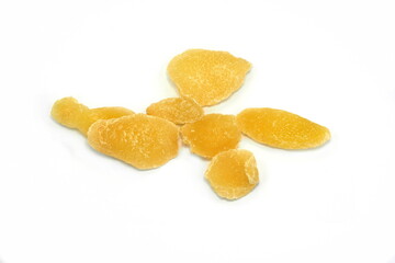 Dried ginger with sugar on a white background. Dried candied ginger isolated.