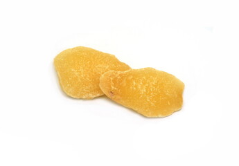 Dried ginger with sugar on a white background. Dried candied ginger isolated.