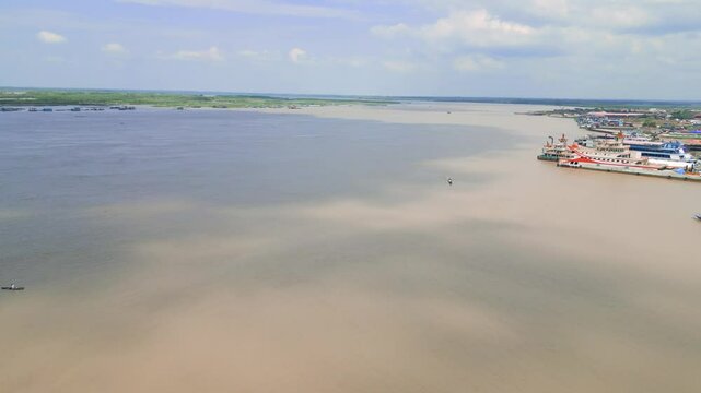 aerial view of the ucayali river with some boats on the water